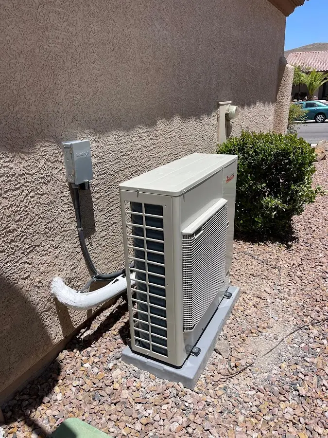 Residential air conditioning condenser unit in Rosedale